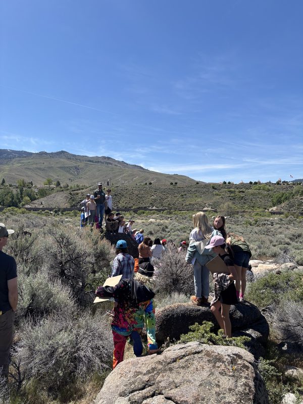 Students exploring a sagebrush-covered bar left by ancient megafloods
