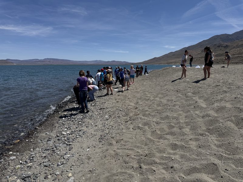 Students along the gravel shore of Pyramid Lake
